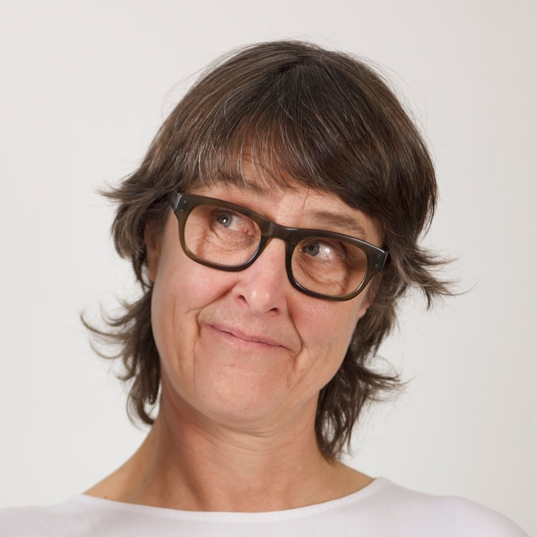 A headshot of Imogen Ashby against a white background.